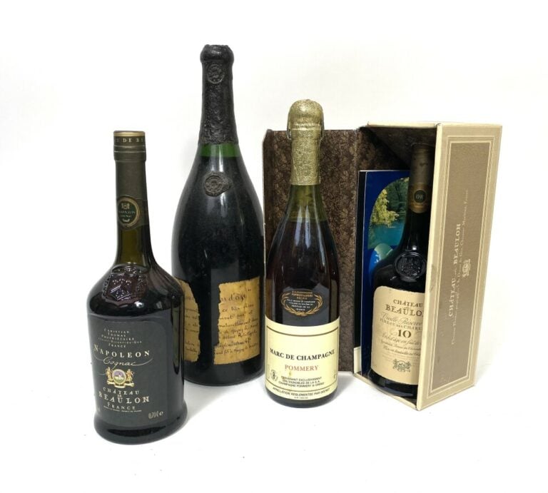 Lot de quatre bouteilles : - Marc de champagne Pommery, Magnum de calvados hors…