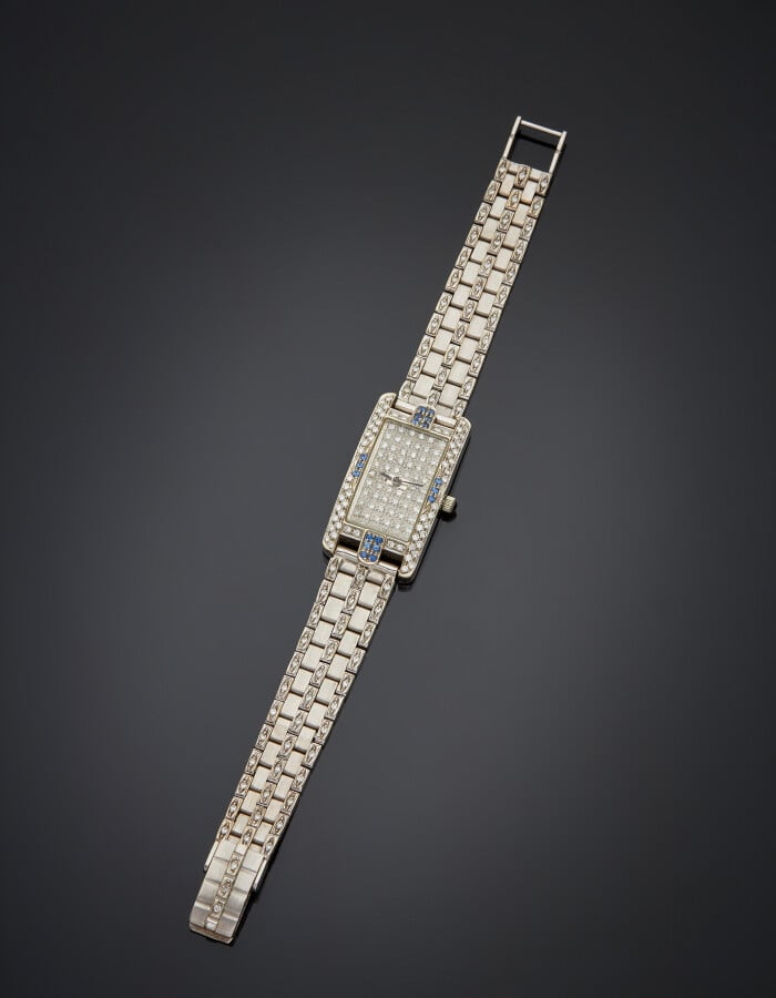 AUREUS - BRACELET MONTRE rectangulaire de dame en or gris (750) légèrement bomb…