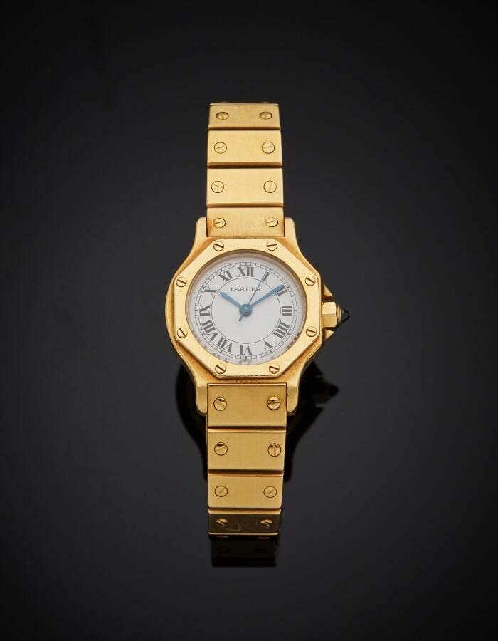 CARTIER - BRACELET MONTRE octogonale de dame, modèle « Santos », en or jaune (7…