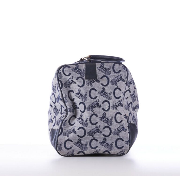 CELINE - 1970s/80s - SAC polochon en toile siglée et cuir marine - 40 x 22 x 16…