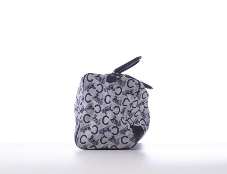 CELINE - 1970s/80s - SAC polochon en toile siglée et cuir marine - 40 x 22 x 16…