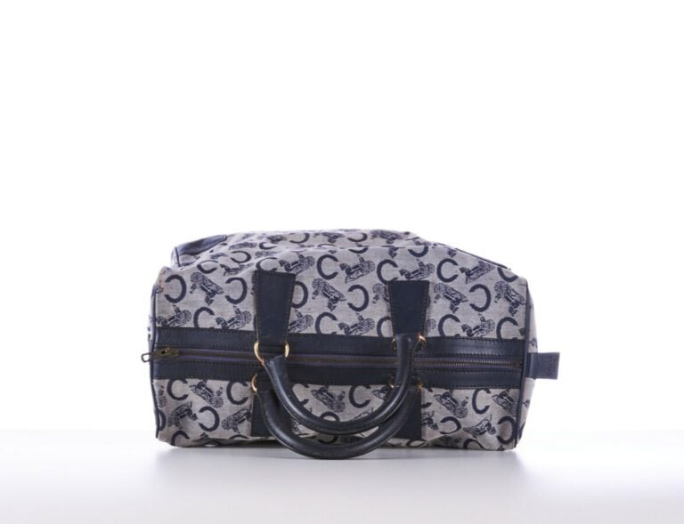 CELINE - 1970s/80s - SAC polochon en toile siglée et cuir marine - 40 x 22 x 16…