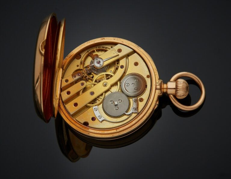 CHARLES OUDIN - MONTRE de POCHE en or rose (750) guilloché, orné d'un monogramm…
