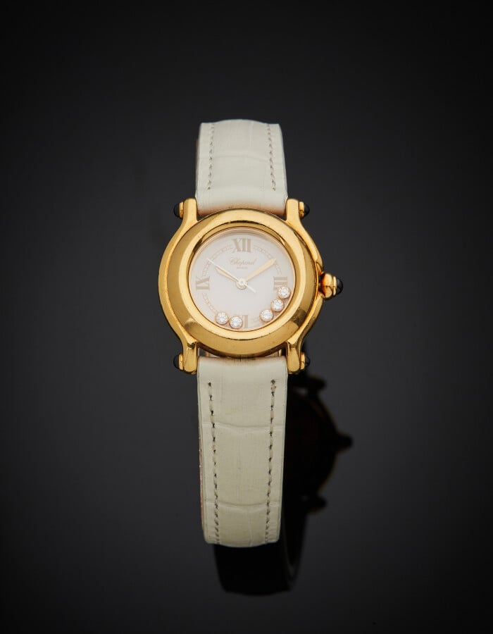 CHOPARD - BRACELET MONTRE ronde, modèle « Happy Sport », de dame, en or jaune (…
