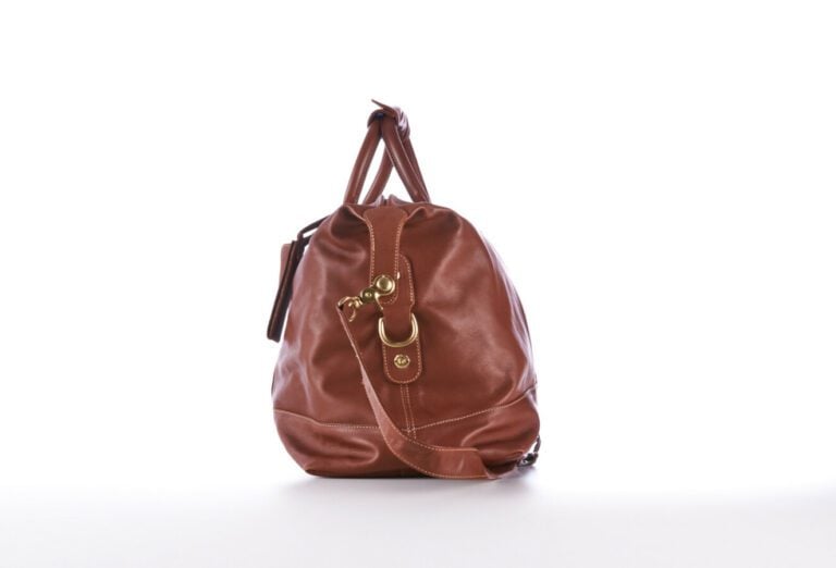 COACH - SAC DE VOYAGE en vache, garnitures en laiton doré, anse bandoulière amo…