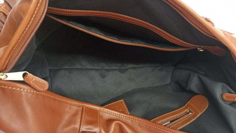 COACH - SAC DE VOYAGE en vache, garnitures en laiton doré, anse bandoulière amo…