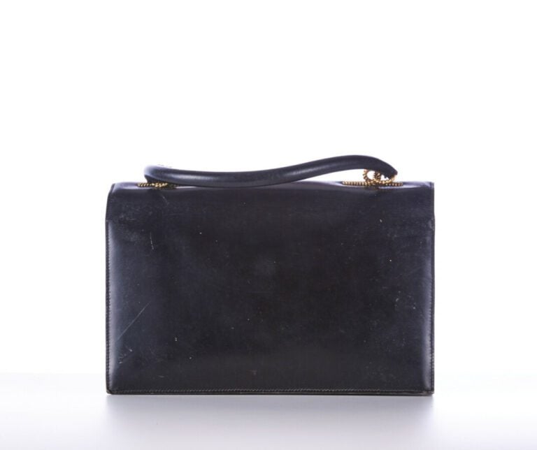 HERMÈS - 1960s - SAC "Cordelière" en box noir, garnitures métal plaqué or - 28…