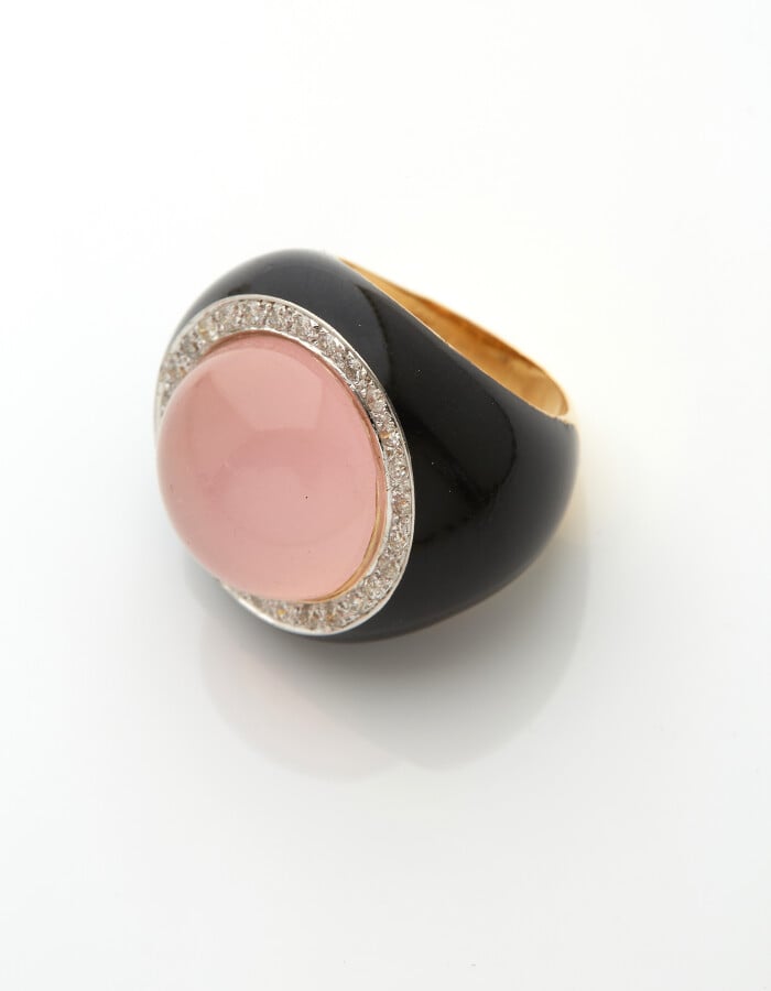 Importante BAGUE circulaire en or jaune et or gris (750) centrée d'un quartz ro…