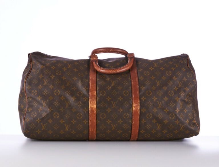 LOUIS VUITTON - SAC DE VOYAGE "Keepall 60" en toile Monogram et cuir naturel, g…