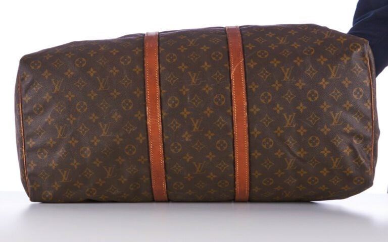 LOUIS VUITTON - SAC DE VOYAGE "Keepall 60" en toile Monogram et cuir naturel, g…