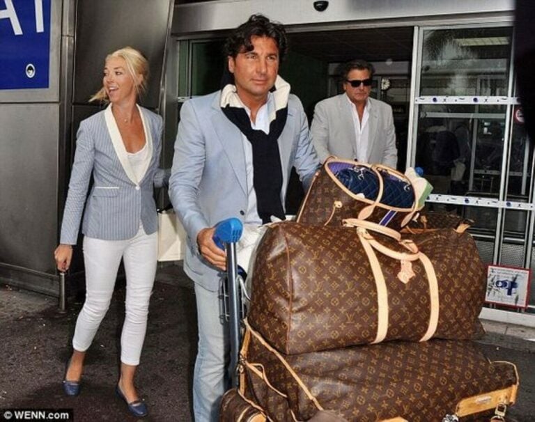LOUIS VUITTON - SAC DE VOYAGE "Keepall 60" en toile Monogram et cuir naturel, g…