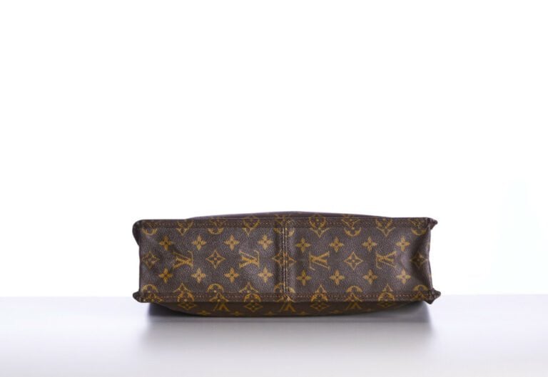 LOUIS VUITTON - SAC "Plat" en toile Monogram et cuir naturel, garnitures en lai…