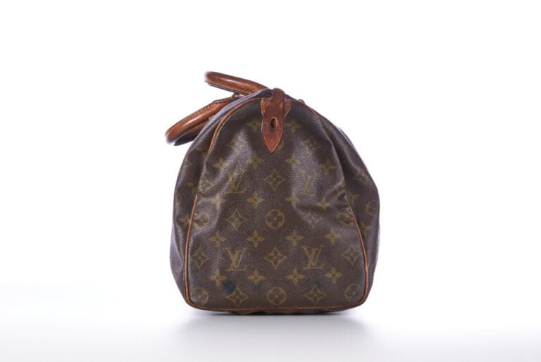 LOUIS VUITTON - SAC "Speedy" en toile Monogram et cuir naturel, garnitures en l…