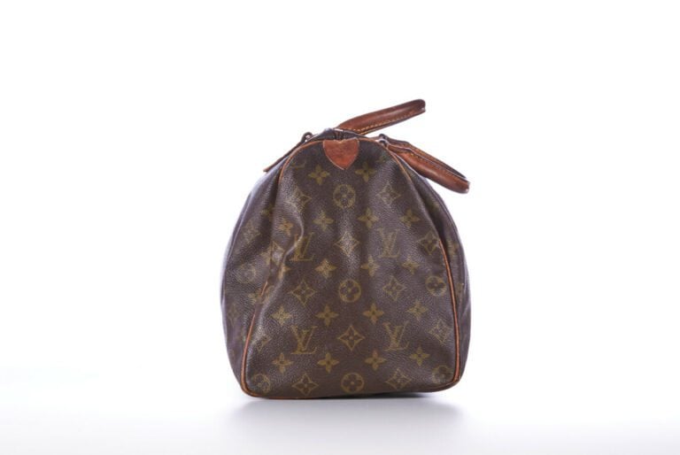 LOUIS VUITTON - SAC "Speedy" en toile Monogram et cuir naturel, garnitures en l…