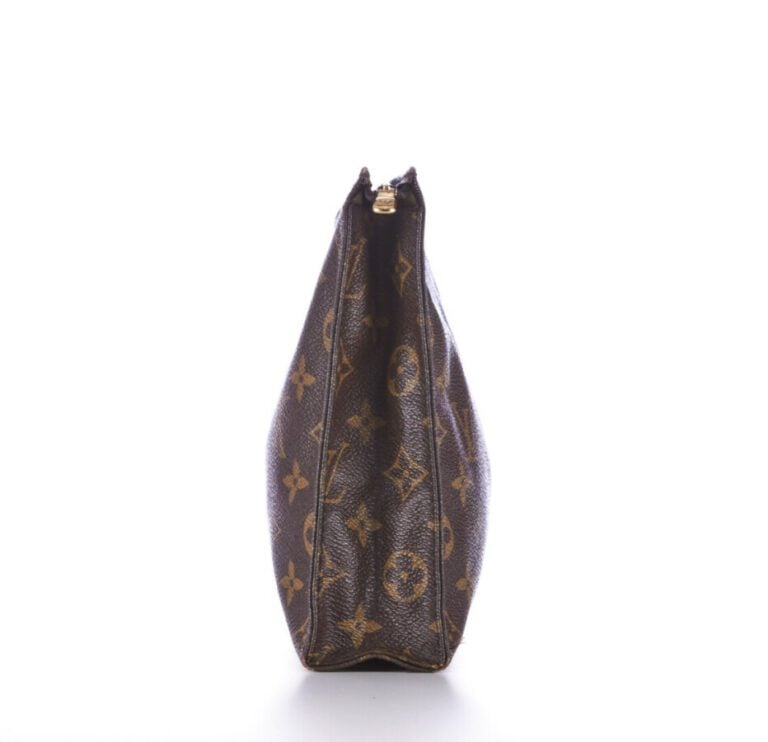 LOUIS VUITTON - Trousse de toilette en toile Monogram - 15 X 19 x 5 cm - (petit…