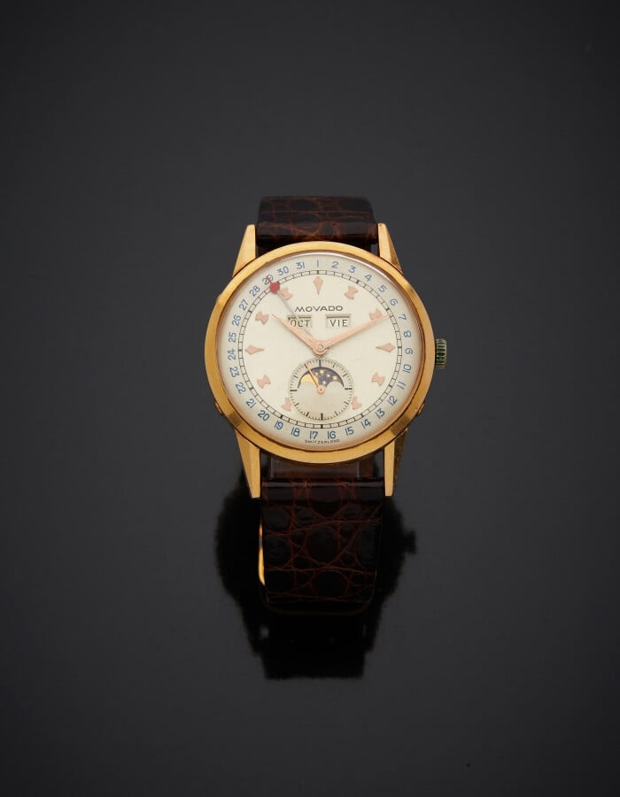 MOVADO - BRACELET MONTRE ronde en or jaune (750). Cadran crème, aiguille centra…