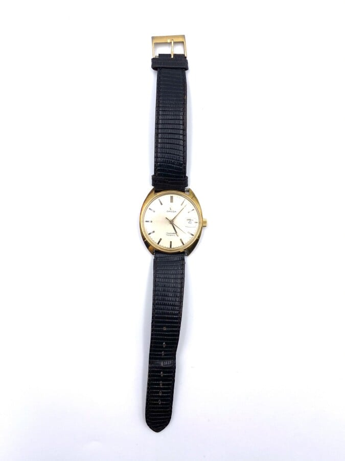 OMEGA - BRACELET MONTRE ronde, « Seamaster Cosmic » en métal doré. cadran satin…