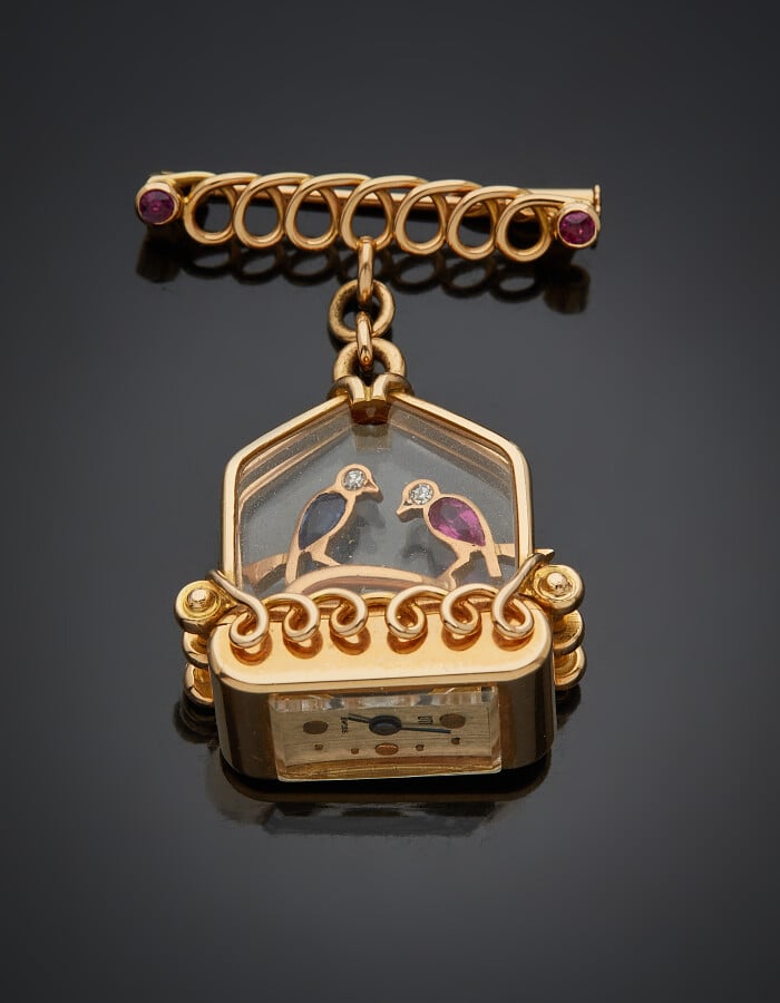 UTI - BIJOU PATRIOTIQUE - MONTRE DE REVERS "cage à oiseaux" en or jaune (750) à…