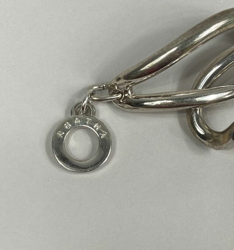 AGATHA - Collier ras de cou rigide articulé en métal argenté, et bracelet assor…