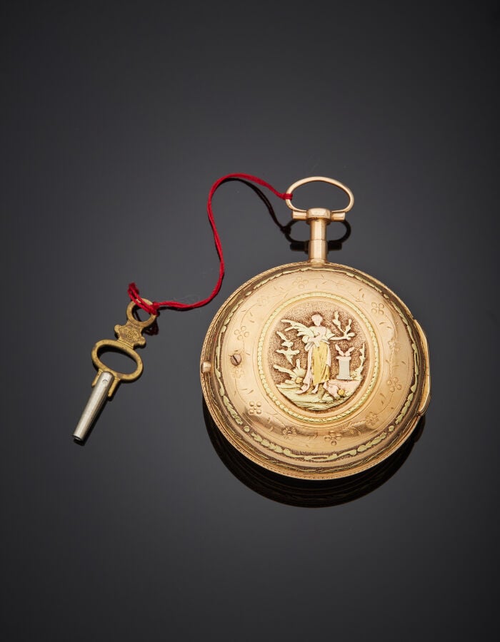 AMALRIC - MONTRE de POCHE trois ors (750‰) ciselé à motifs de guirlandes et d'u…