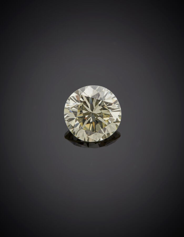 BAGUE « solitaire » en or gris (750‰) serti d'un diamant taille brillant pesant…