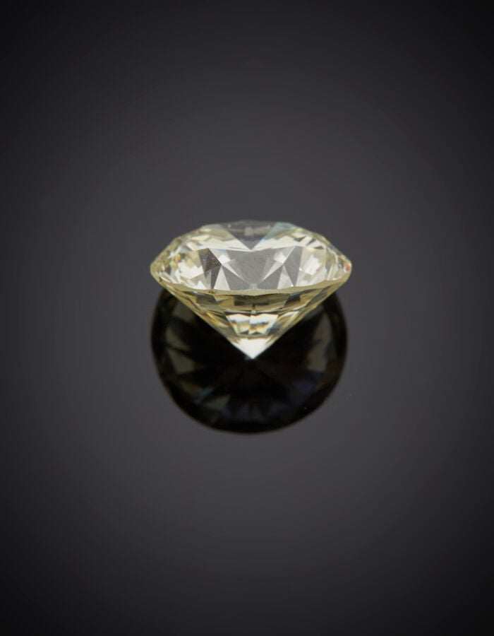 BAGUE « solitaire » en or gris (750‰) serti d'un diamant taille brillant pesant…