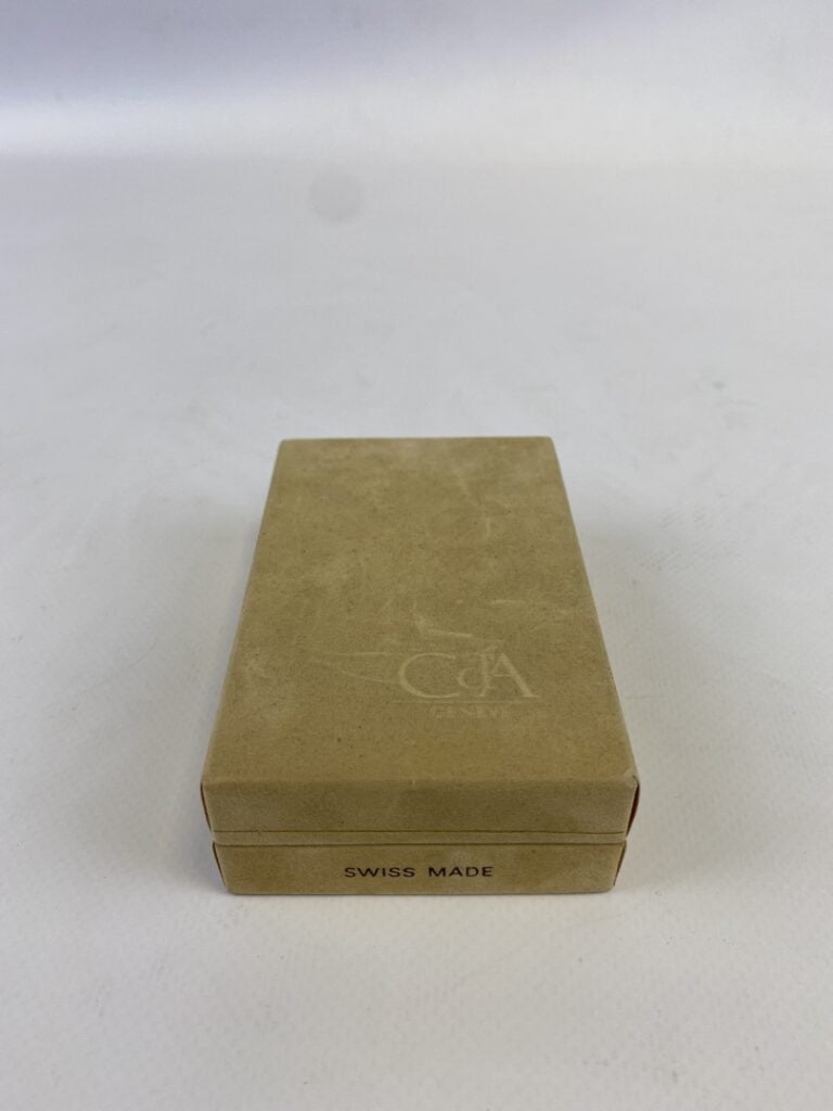 CARAN D'ACHE - Briquet en métal argenté et doré - Avec écrin de la maison
