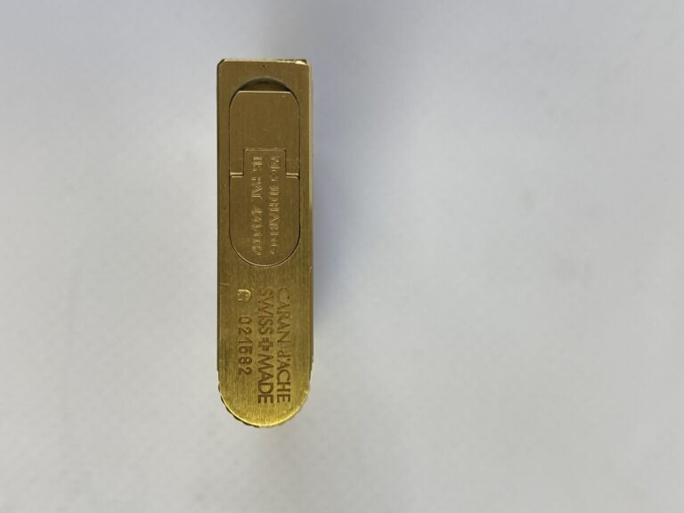 CARAN D'ACHE - Briquet en métal argenté et doré - Avec écrin de la maison