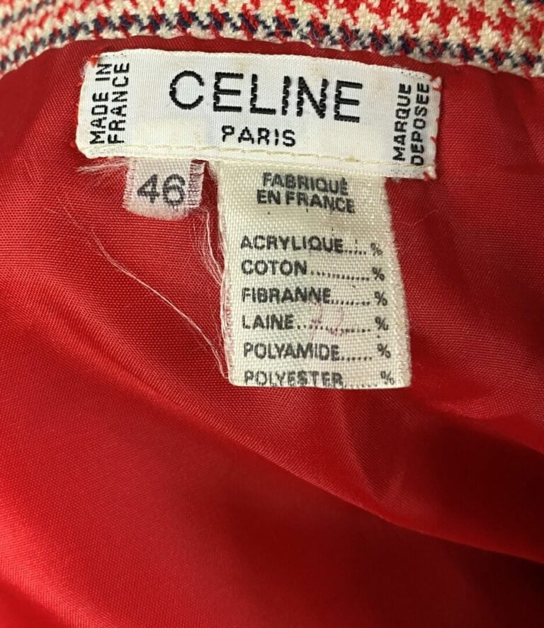 CELINE - Jupe longueur midi à plis plats sur le devant et motif pied de poule