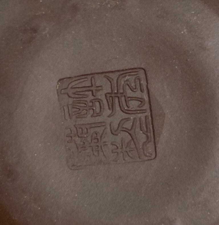 CHINE, XXe siècle - Théière en terre cuite formant citrouille.Anse en forme de…
