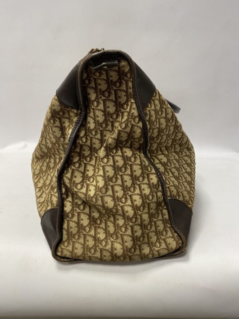 Christian Dior sac de voyage vintage grand modèle en toile monogrammée et cuir…