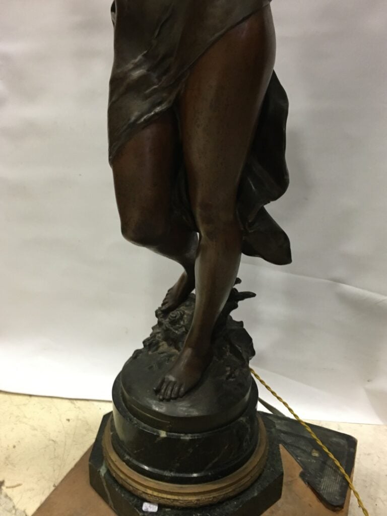 D'après Mathurin MOREAU. - La Vérité - Porte-torchère en régule à patine brune,…