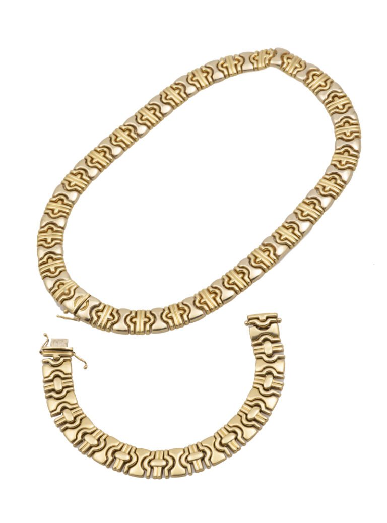 DEMI PARURE géométrique en or jaune (750 millièmes) comprenant un COLLIER et un…