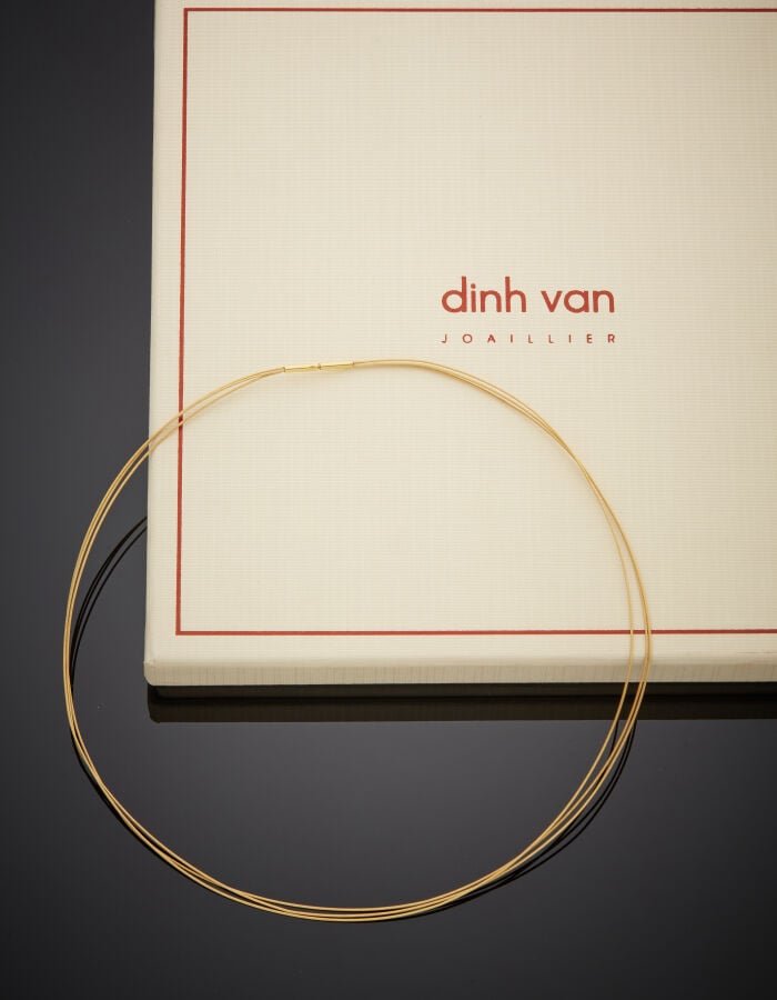 DINH VAN - Deux COLLIERS en or jaune (750‰) à 10 bruns et 3 bruns (légers chocs…