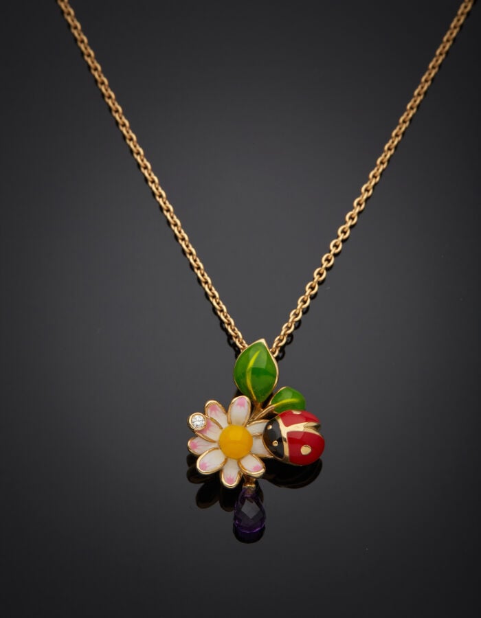 DIOR - COLLIER chaînette, collection "Diorette", en or jaune (750‰) et son PEND…