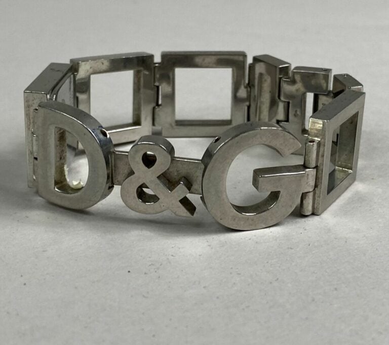 DOLCE & GABBANA - Montre bracelet de dame en acier, boîtier carré, cadran à fon…