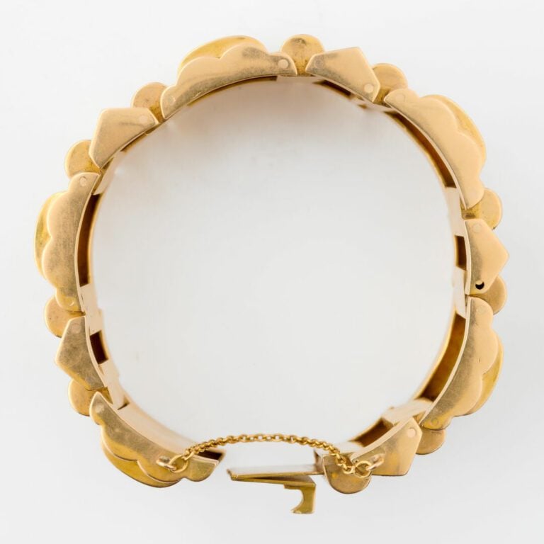 Elégant bracelet Tank en or jaune (750) à maillons articulés formés de motifs b…