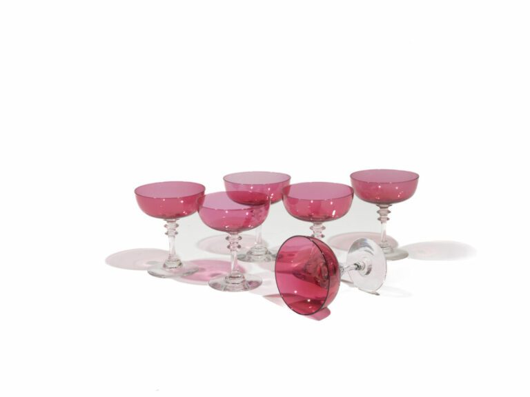 Ensemble de 15 coupes à champagne en cristal rose, pied transparent