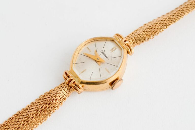 EXACTA - Montre bracelet de dame en or jaune (750), boîtier oblong, cadran à fo…