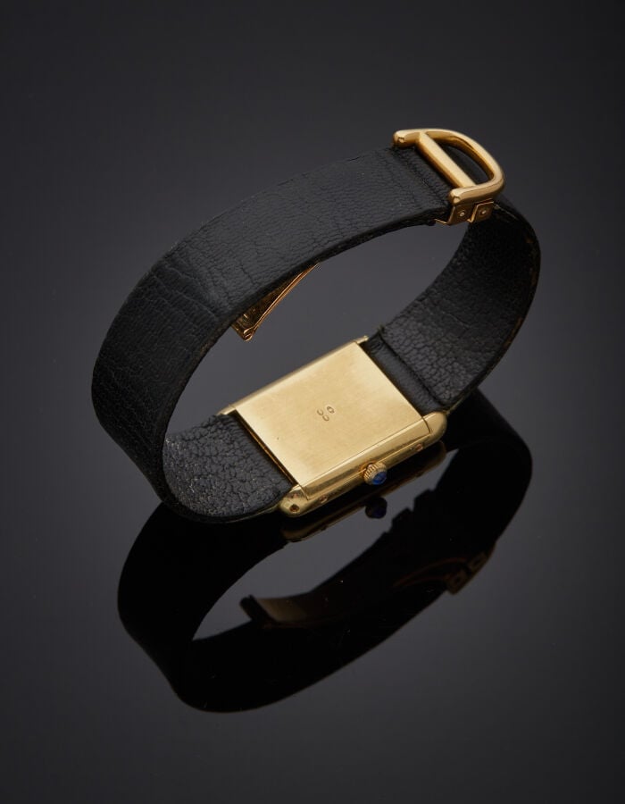 FRED - BRACELET MONTRE rectangulaire de dame, en or jaune (750‰). Cadran émail…