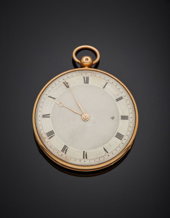 Importante MONTRE de POCHE en or rose (750‰) entièrement guilloché à motif rayo…