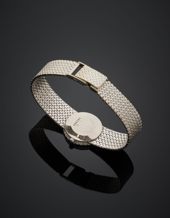 JAEGER LECOULTRE - BRACELET MONTRE ronde de dame, en or gris (750‰). Lunette se…