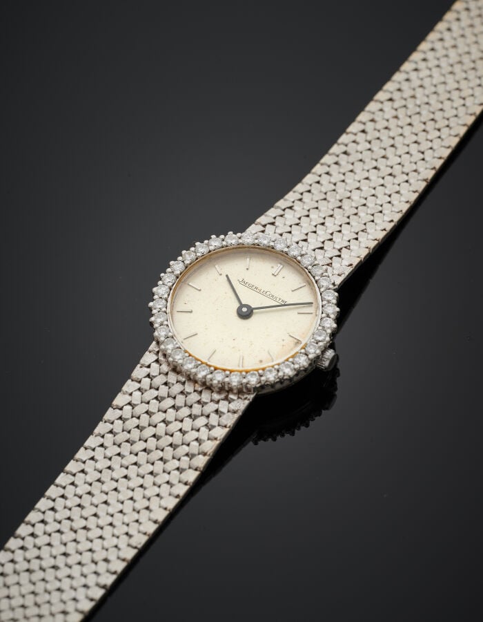 JAEGER LECOULTRE - BRACELET MONTRE ronde de dame, en or gris (750‰). Lunette se…