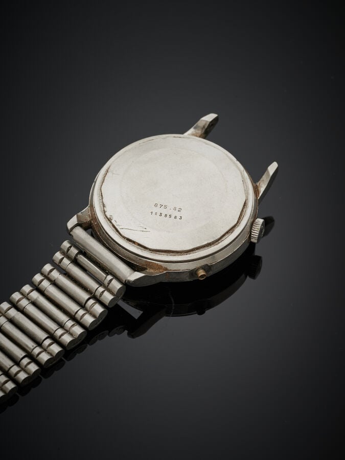 JAEGER LECOULTRE - BRACELET MONTRE ronde Réveil, modèle "Memovox" en acier. Cad…