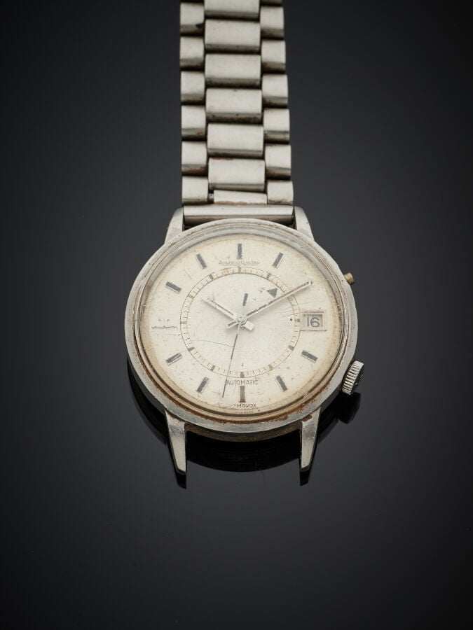 JAEGER LECOULTRE - BRACELET MONTRE ronde Réveil, modèle "Memovox" en acier. Cad…