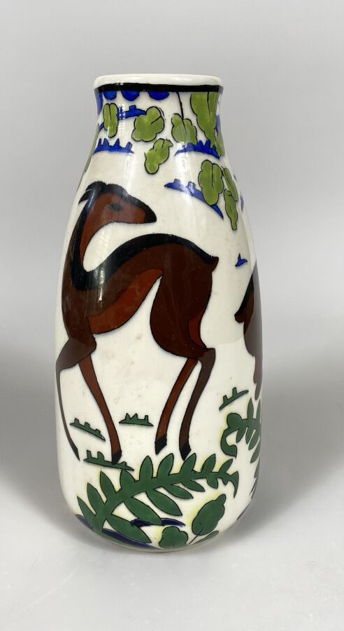 KERAMIS - Vase en céramique polychrome à décor de biches entourées de verdure,…