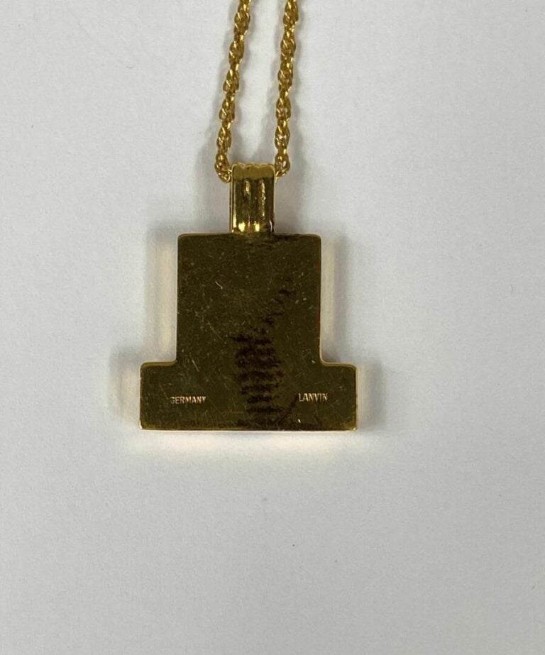 LANVIN - Chaîne en métal doré à maille torsadée retenant un pendentif à motif r…