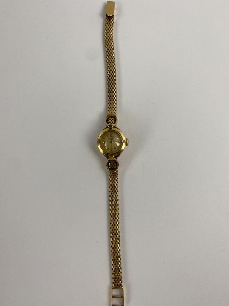 LONGINES - Montre bracelet de dame en or jaune (750), boîtier rond - Cadran à f…