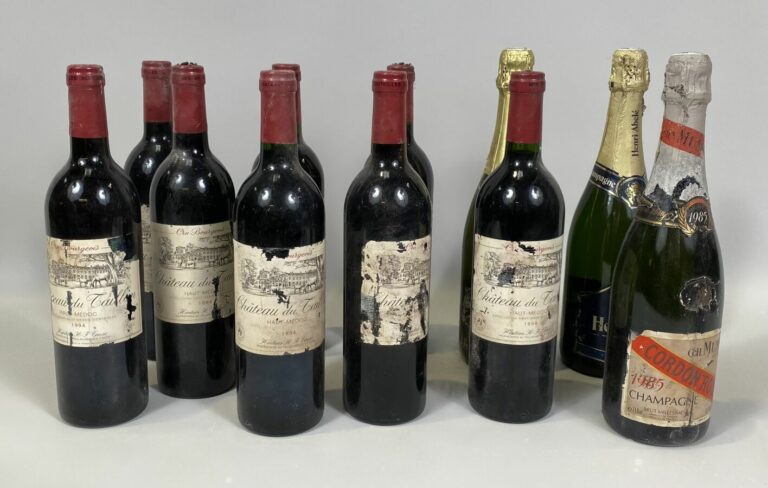 Lot de 11 bouteilles : - 8 ch du taillant, 1994, Ht Médoc - 1 Chamapgne Doquet-…