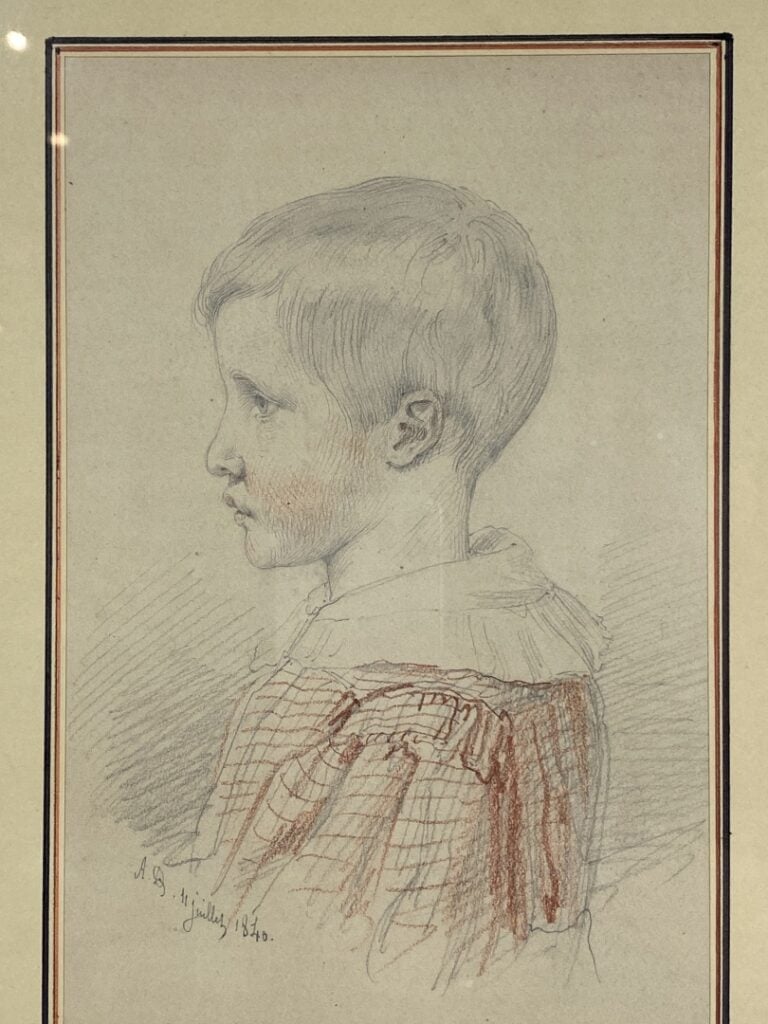 Lot de deux dessins encadrés sous verre: - Ecole du XIXe, portrait d'enfant de…